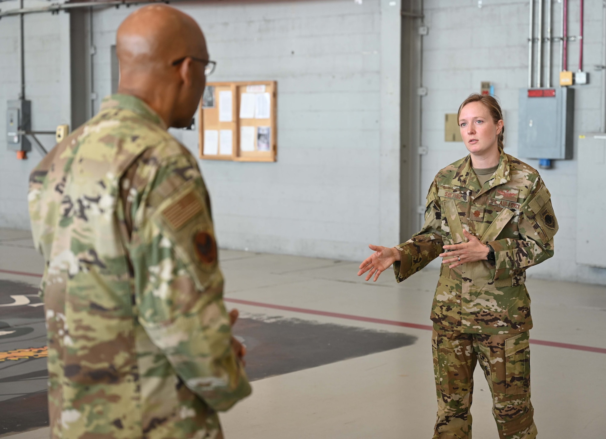 U.S. Air Force Maj. Auriele Soltisz, AC-130J Ghostrider pilot with the 4th Special Operations Squadron, briefs Air Force Chief of Staff Gen. CQ Brown, Jr., on Aviation Special Operations Task Units during his visit to Hurlburt Field, Florida, April 4, 2022. Brown’s visit also familiarized him with Air Force Special Operations Command’s Force Generation Model to include: Mission Sustainment Teams and Special Operations Task Groups. Additionally, Brown held a sensing session with junior enlisted Airmen to discuss challenges faced in the command. (U.S. Air Force photo by Staff Sgt. Brandon Esau)