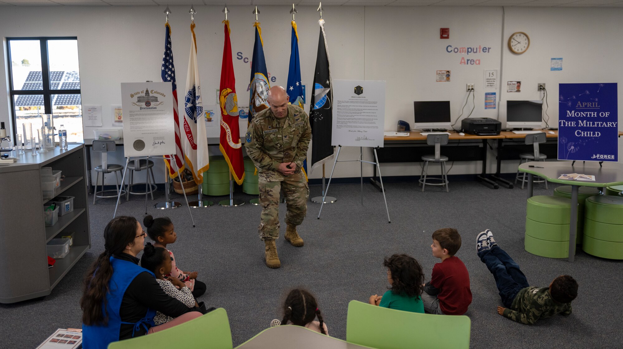 Military member speaks to kids