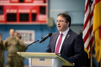 ANSBACH, Germany - Dr. Johannes Urban, ministerial counsellor, Head of Armed Forces Affairs, Security Defense Policy in the Bavarian State Chancellery, addresses Soldiers from the U.S. Army V Corps headquarters and members of the city of Ansbach during a welcome ceremony at Barton Barracks in Ansbach, Germany, Tuesday, April 5. During the ceremony, the V Corps headquarters and the headquarters and headquarters battalion uncased their colors at their temporary home. The presence of the entire Victory Corps headquarters in Europe expands U.S. Army Europe and Africa’s ability to command land forces in Europe and sends a strong message to our NATO allies and partners that the United States is committed to European security and our NATO obligations. (U.S. Army photo by Capt. Angelo Mejia)