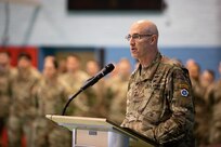 ANSBACH, Germany - Maj. Gen. Robert Burke, deputy commanding general of support, V Corps, addresses Soldiers from the V Corps headquarters and members of the city of Ansbach during a welcome ceremony at Barton Barracks in Ansbach, Germany, Tuesday, April 5. During the ceremony, the V Corps headquarters and the headquarters and headquarters battalion uncased their colors at their temporary home. The presence of the entire Victory Corps headquarters in Europe expands U.S. Army Europe and Africa’s ability to command land forces in Europe and sends a strong message to our NATO allies and partners that the United States is committed to European security and our NATO obligations. (U.S. Army photo by Capt. Angelo Mejia)