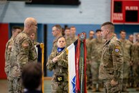ANSBACH, Germany - Maj. Gen. Robert Burke, deputy commanding general of support, V Corps, and Sgt. Maj. Mike Lamkins, operations sergeant major, V Corps, unfurls the unit colors during a welcome ceremony at Barton Barracks in Ansbach, Germany, Tuesday, April 5. During the ceremony, the V Corps headquarters and the headquarters and headquarters battalion uncased their colors at their temporary home. The presence of the entire Victory Corps headquarters in Europe expands U.S. Army Europe and Africa’s ability to command land forces in Europe and sends a strong message to our NATO allies and partners that the United States is committed to European security and our NATO obligations. (U.S. Army photo by Capt. Angelo Mejia)