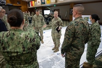 Army Lt. Col. Tiffianey Laurin, Joint Task Force Civil Support future operations division chief, gives a brief during the command’s spring mission planning conference at the Phantom Warrior Center on Fort Hood, Tx.