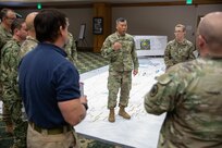 Army Maj. Christopher Colyer, assigned to the Joint Task Force Civil Support future operations cell, gives a brief during the command’s spring mission planning conference at the Phantom Warrior Center on Fort Hood, Tx.