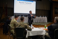 Brooke Buddemeier, a certified health physicist with Lawrence Livermore National Laboratory, delivers a presentation as the keynote speaker at Joint Task Force Civil Support’s spring mission planning conference at the Phantom Warrior Center on Fort Hood, Texas.