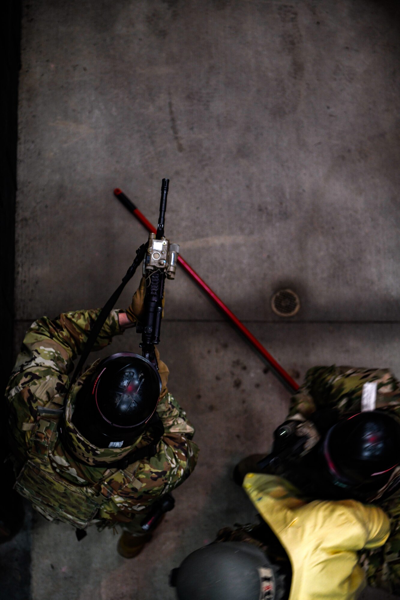 Air Force Reserve Command Defenders assigned to the 446th Security Forces Squadron, Joint Base Lewis-McChord, Washington, work their way through a live-fire training scenario, March 20, 2022, at the shoot-house at Camp James A. Garfield Joint Military Training Center, Ohio.