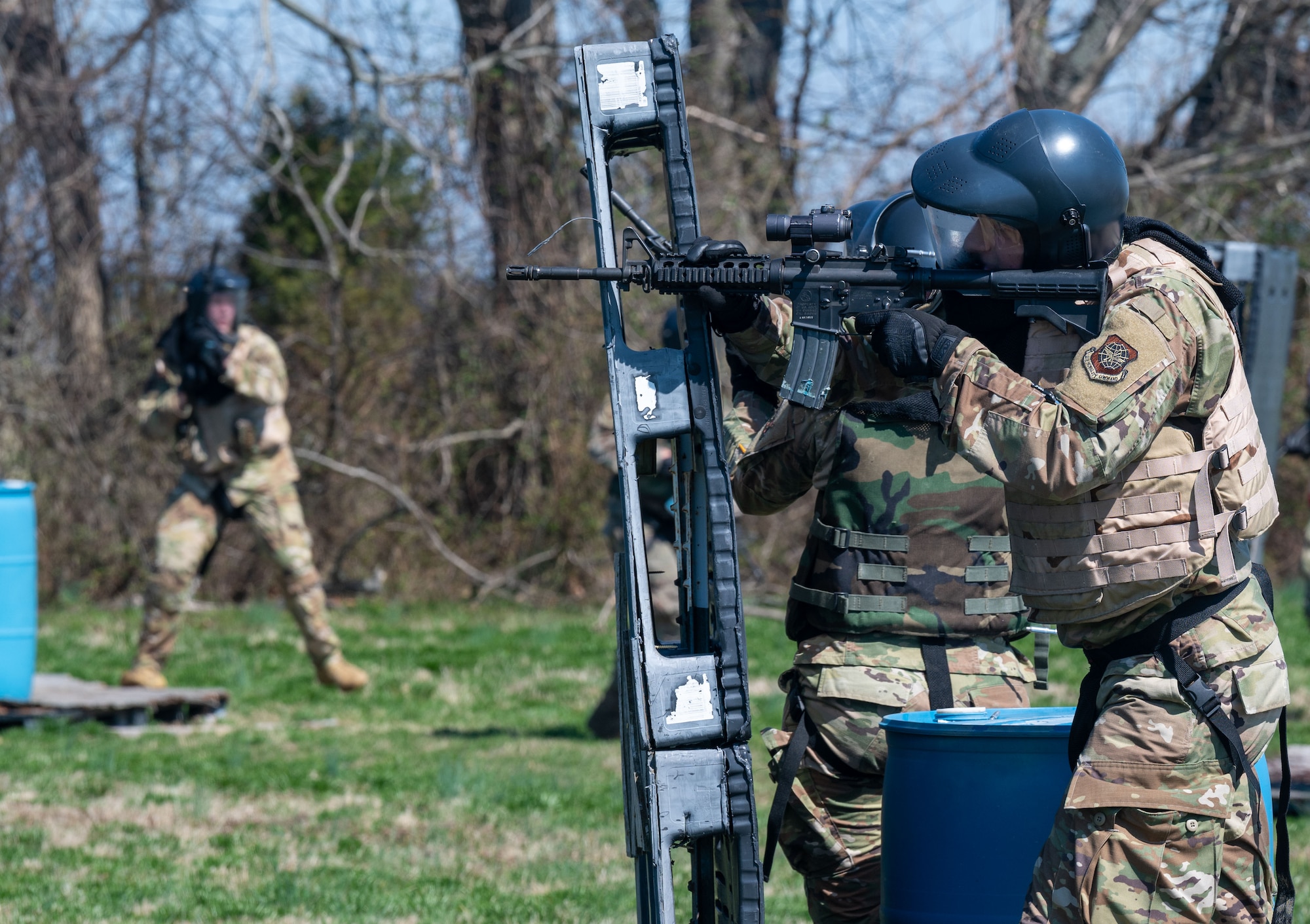 Airman 1st Class Jakob Steinbeck, 436th Operations Support Squadron radar airfield weather systems apprentice, fires simulated rounds during a Tactics and Leadership Nexus exercise on Dover Air Force Base, Delaware, March 18, 2022. The goal of TALN is to enhance readiness and train multi-capable Airmen. Recent additions to the course include land navigation, active shooter drills and unexploded ordnance exercises. (U.S. Air Force photo by Airman 1st Class Cydney Lee)