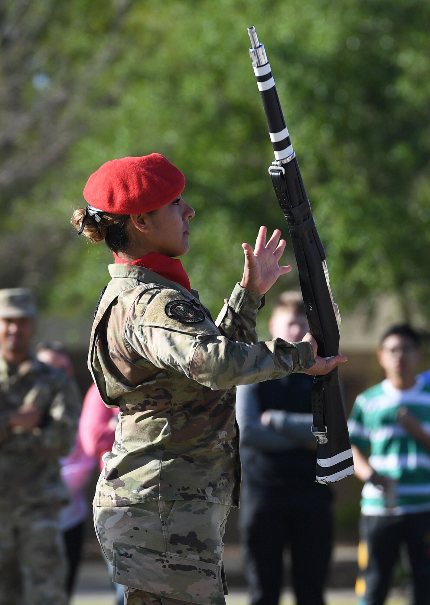 A Member of the 336th Training Squadron freestyle drill team performs during the 81st Training Group drill down on the Levitow Training Support Facility drill pad at Keesler Air Force Base, Mississippi, April 1, 2022. Keesler trains more than 30,000 students each year. While in training, Airmen are given the opportunity to volunteer to learn and execute drill down routines. (U.S. Air Force photo by Kemberly Groue)