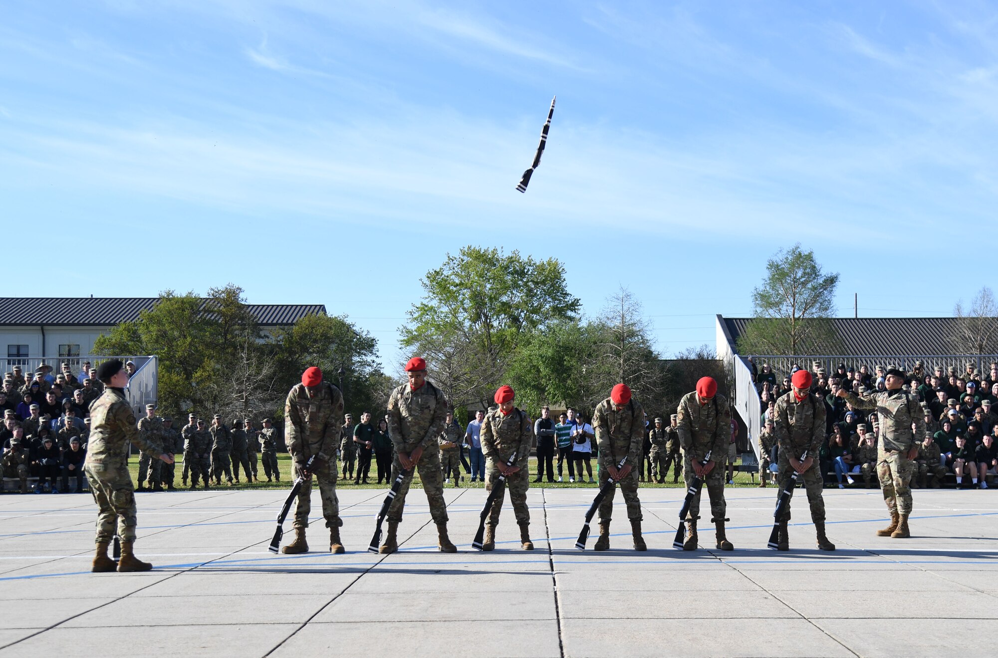 Members of the 336th Training Squadron freestyle drill team perform during the 81st Training Group drill down on the Levitow Training Support Facility drill pad at Keesler Air Force Base, Mississippi, April 1, 2022. Keesler trains more than 30,000 students each year. While in training, Airmen are given the opportunity to volunteer to learn and execute drill down routines. (U.S. Air Force photo by Kemberly Groue)