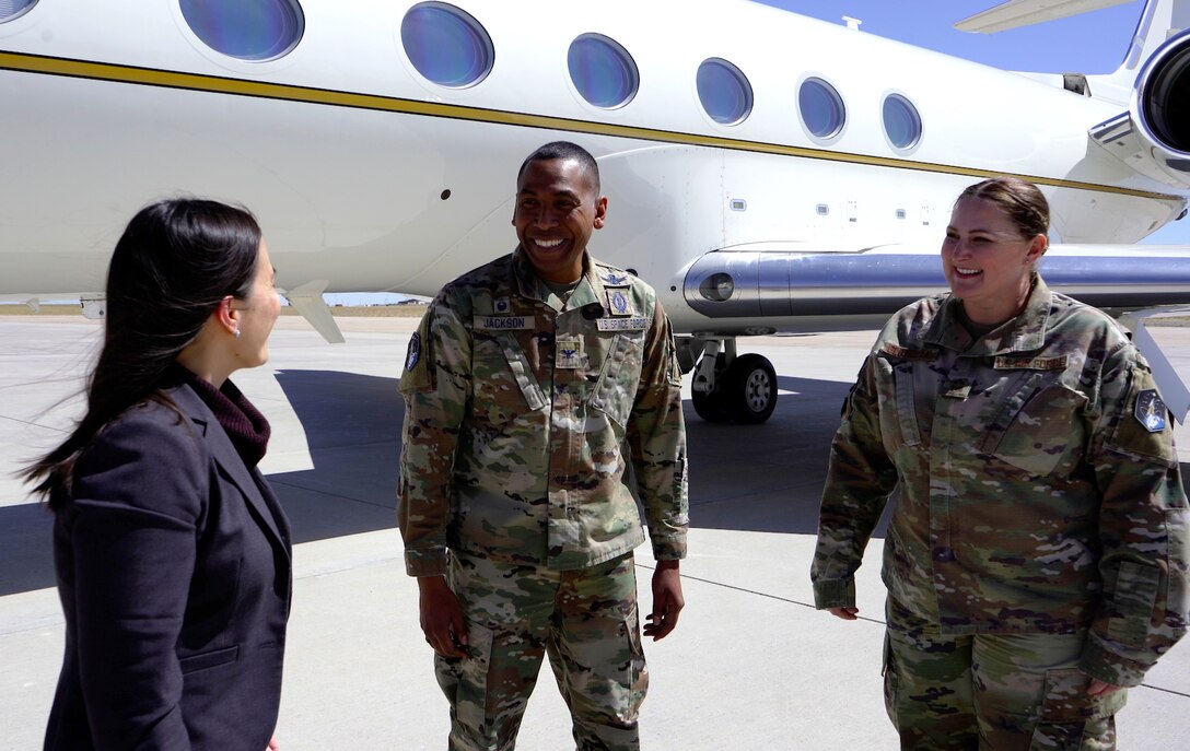 The Honorable Gina Ortiz Jones, Under Secretary of the Air Force, is greeted by Col. Marcus Jackson, the Buckley Garrison commander and Chief Master Sgt. Janna Glotfelty, the 460th MSG senior enlisted leader at Buckley Space Force Base, Colo., April 4, 2022.