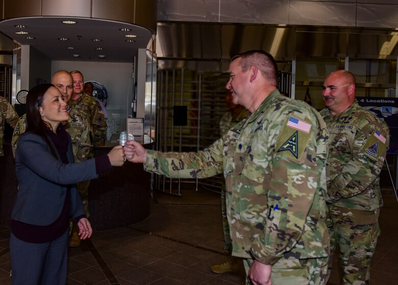 The Honorable Gina Ortiz Jones, Under Secretary of the Air Force, greets U.S. Space Force members at the Mission Control Station lobby on Buckley Space Force Base, Colo., April 4, 2022.