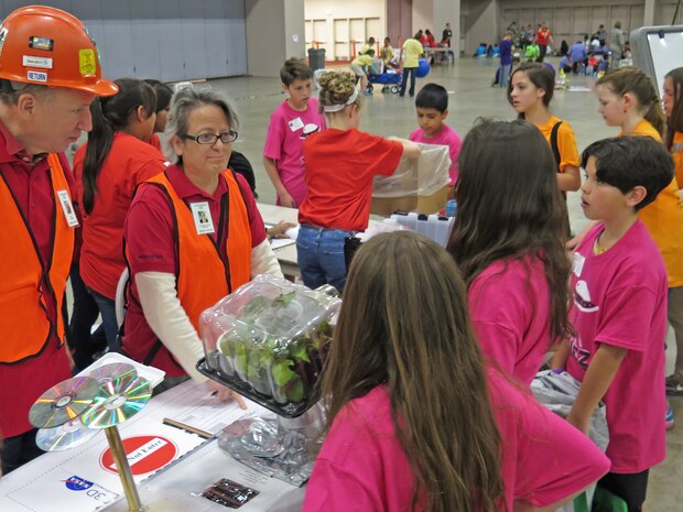 Dr. Imelda Atencio, Air Force Research Laboratory senior scientist, serving as a Colony Commander at the AFRL STEM Academy Mars Link-up Day held May 8, 2015 at the Albuquerque Convention Center. The annual event draws over a 1,000 students and teachers from classrooms across New Mexico. (U.S. Air Force Photo / Stephen Burke)