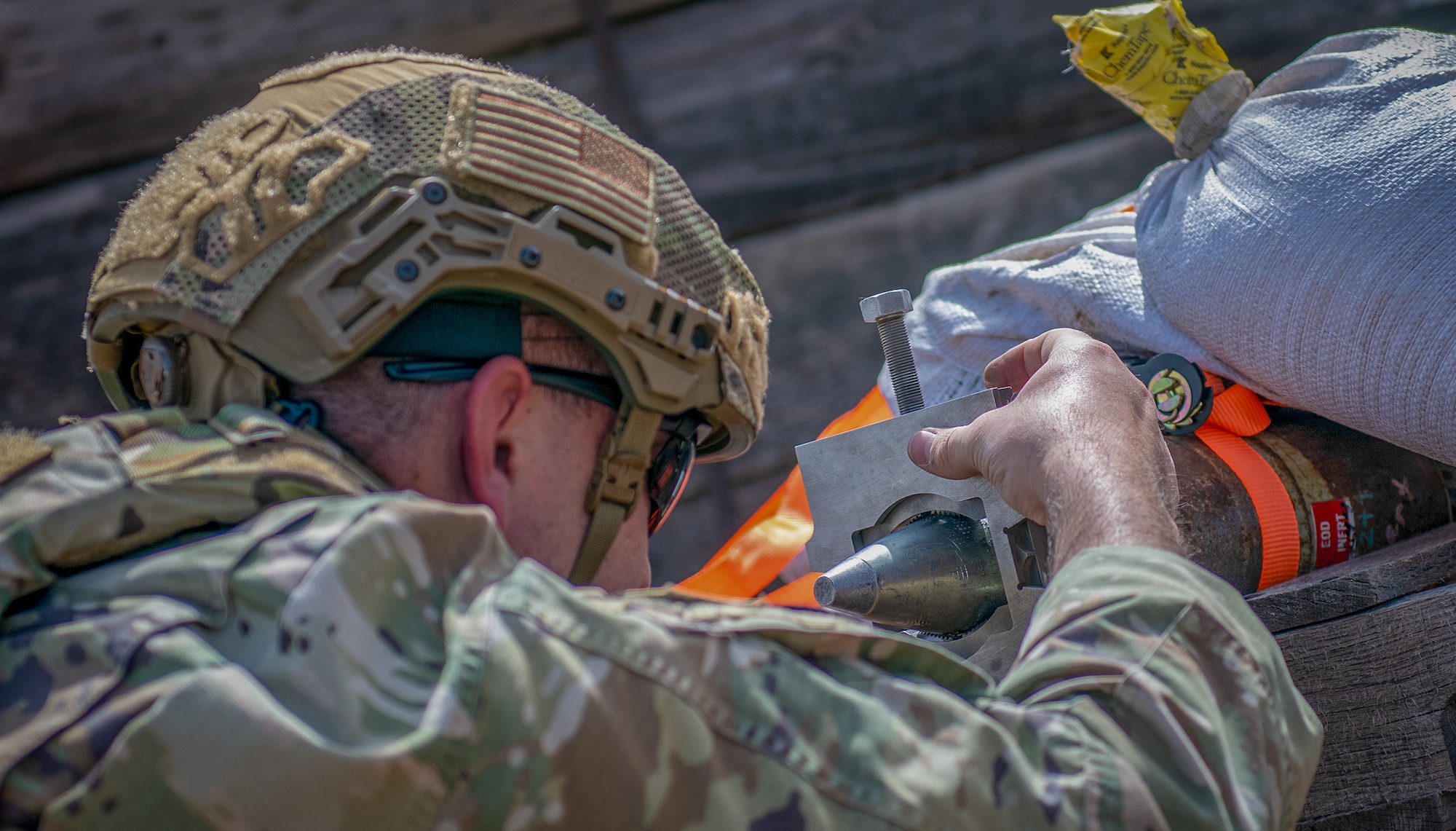 Staff Sgt. Austin Kener, Explosive Ordnance Disposal Technician with the 419th EOD Flight, prepares to remove an inert fuse