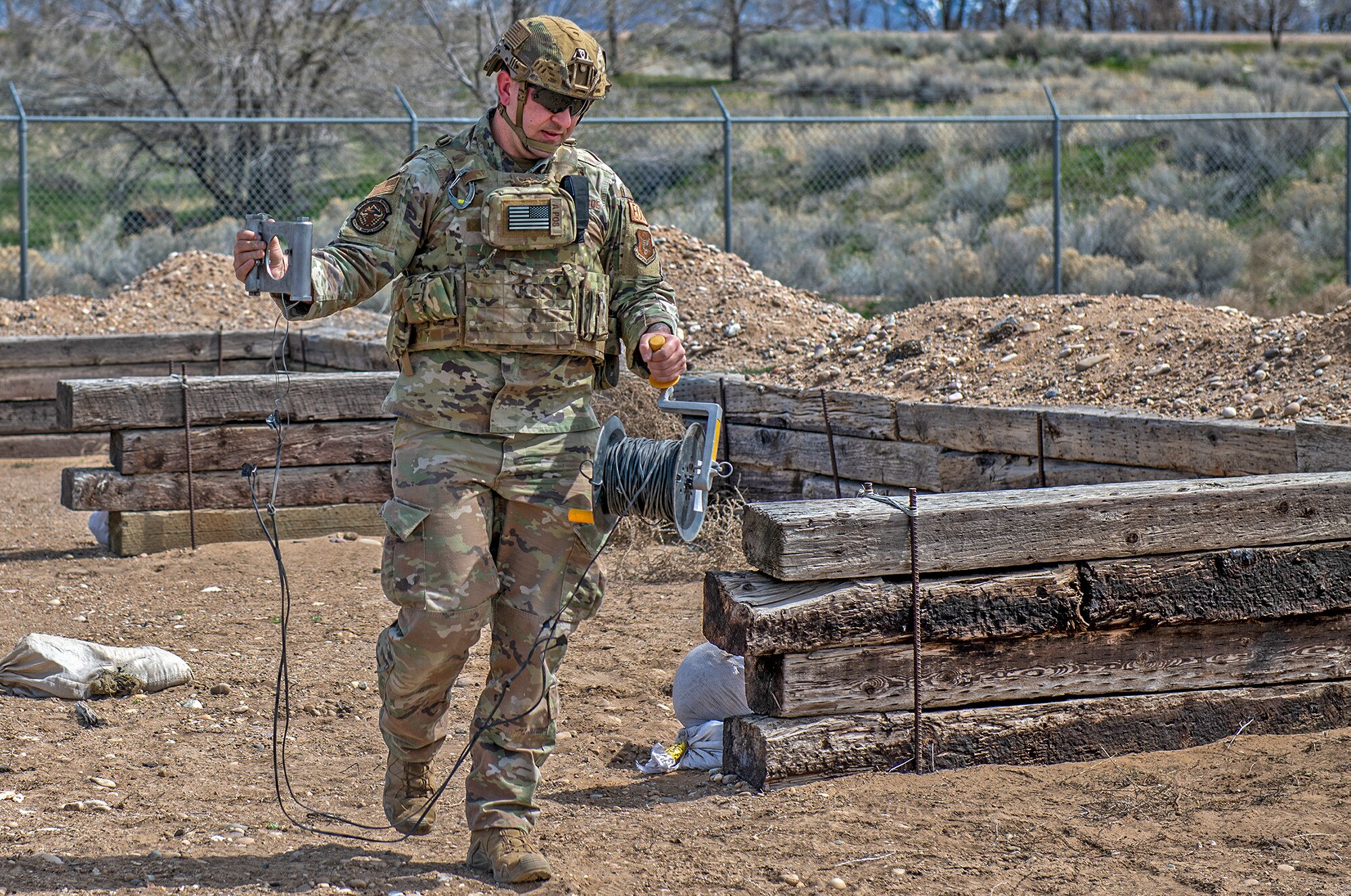 Staff Sgt. Austin Kener, Explosive Ordnance Disposal Technician with the 419th EOD Flight, prepares to remove an inert fuse