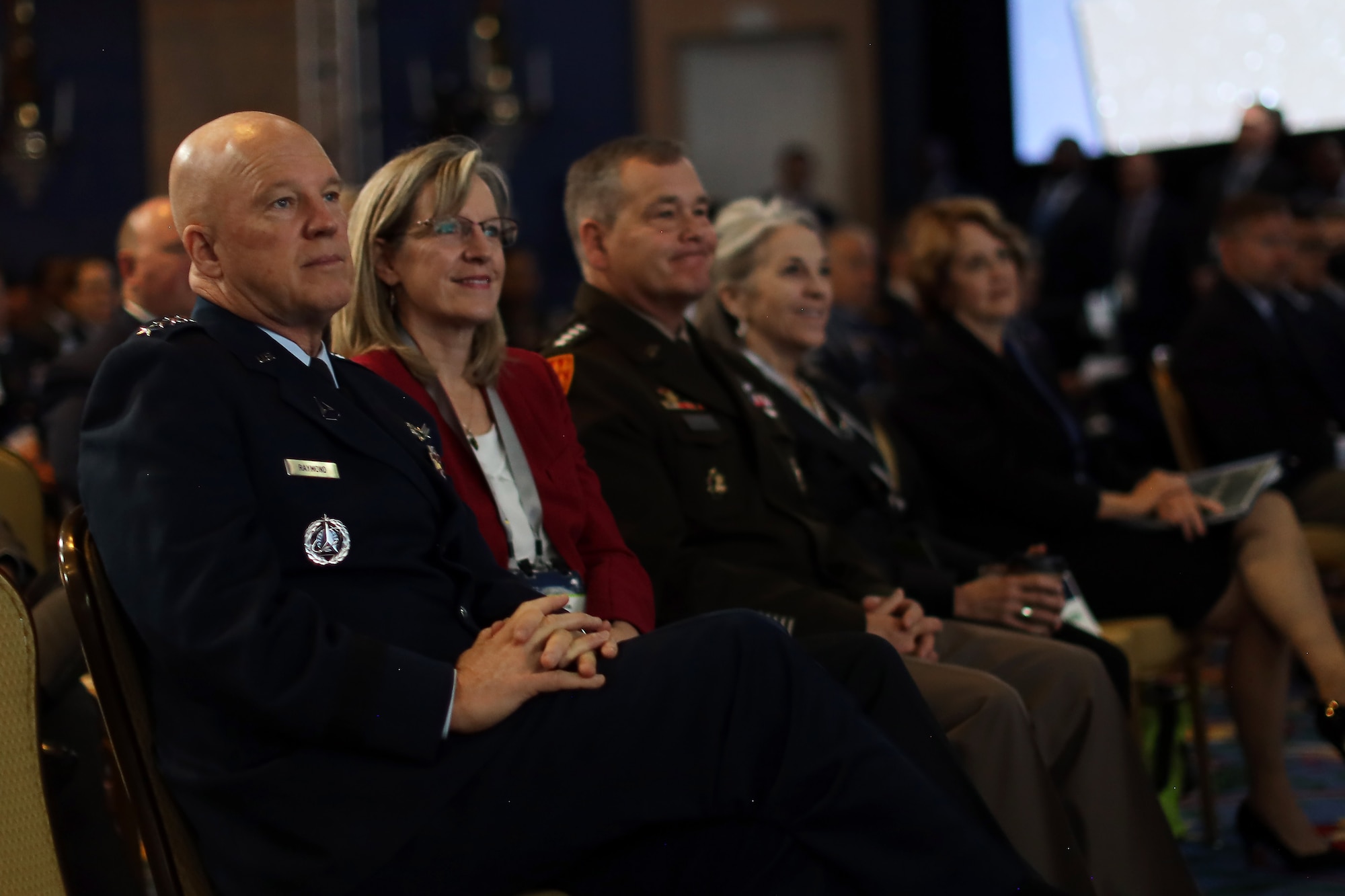 Chief of Space Operations Gen. John W. “Jay” Raymond and his wife Mollie, listen as Secretary of the Air Force Frank Kendall delivers the keynote address at the Space Foundations 37th Space Symposium April 5, 2022 in Colorado Springs, CO. (Courtesy photo)