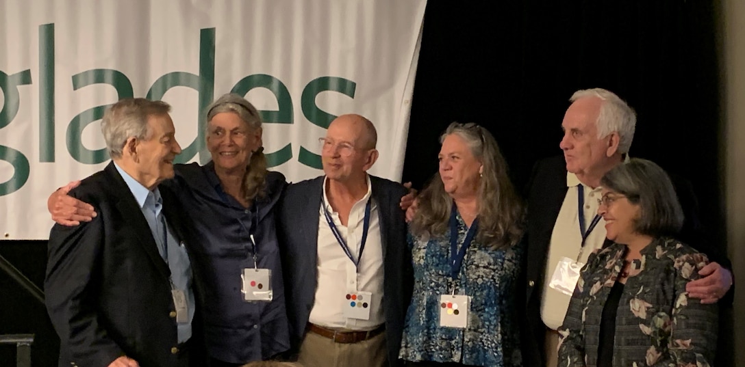 Kim Taplin was there at the beginning of Everglades restoration, working with Dick Pettigrew who led the Governor’s Commission for Sustainable South Florida and was recently honored at the 37th Annual Everglades Coalition. At the event, pictured left to right, are Dick Pettigrew, and other key players in the early days of Everglades restoration, including Maggy Hurchalla, Jim Murley, Kim Taplin, and former Jacksonville District Commander Rock Salt, joined by Mayor Daniella Levine Cava. Their work resulted in the Corps developing a conceptual plan for Everglades restoration, which ultimately became the basis for the Comprehensive Everglades Restoration Plan (CERP) and continues as the blueprint for Everglades restoration.