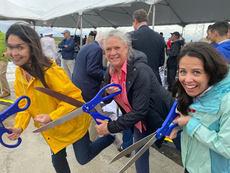Shannon Estenoz, Kim Taplin and Megan Jacoby celebrate at the ribbon cutting ceremony for the Indian River Lagoon-South C-44 Reservoir and Stormwater Treatment Area, one of the Everglades restoration projects Taplin worked on and was able to see come to fruition.