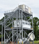 IMAGE: A 40-foot tower constructed at Naval Surface Warfare Center Dahlgren Division (NSWCDD) is topped by a radar prototype used in foreign comparative testing. The middle-level contains a command and control room. This effort supports the Navy’s Future X-Band Radar program.