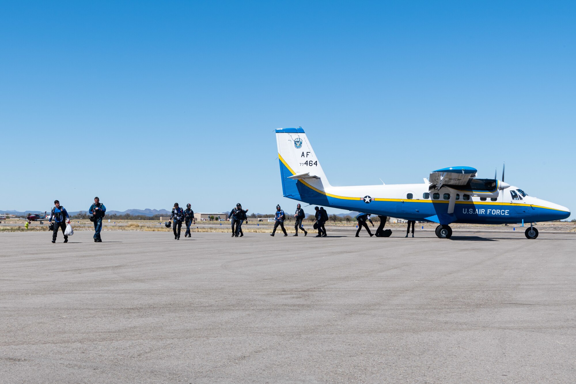 Wings of Blue cadets disembark from their Twin Otter and set up at Marana Airport, AZ.