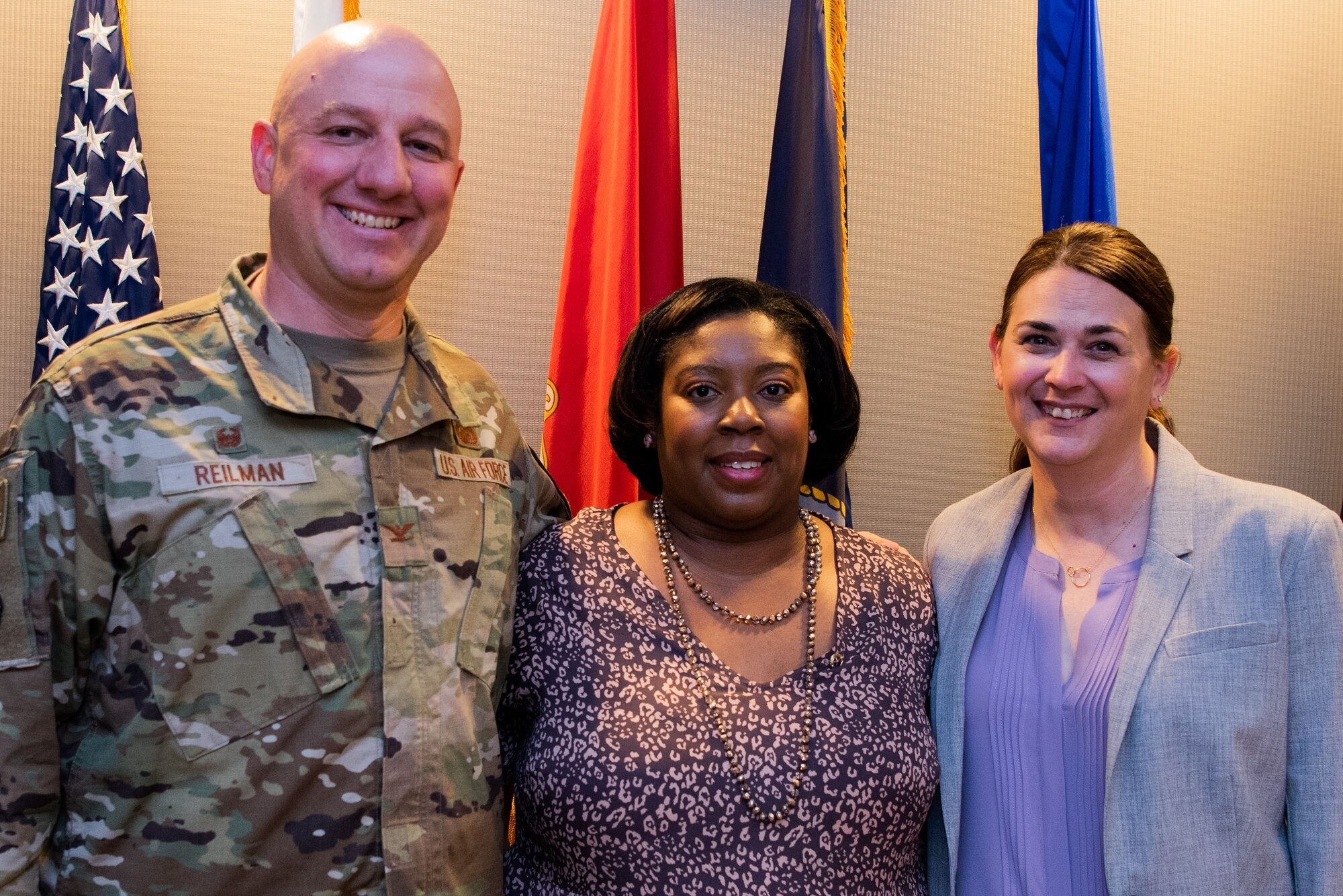 U.S. Air Force Col. Matthew Reilman, 17th Training Wing commander, poses with Cayssia David, gold star spouse, and Katie Reilman, 17th Training Wing key spouse, during the 17th Training Wing’s first-ever Gold Star Spouses Day recognition luncheon at Goodfellow Air Force Base, Texas, April 5, 2022. David has been an active member of the gold star community since her husband, U.S. Army Spc. Steven R. Givens was killed in action while deployed in Balad, Iraq. (U.S. Air Force photo by Senior Airman Michael Bowman)