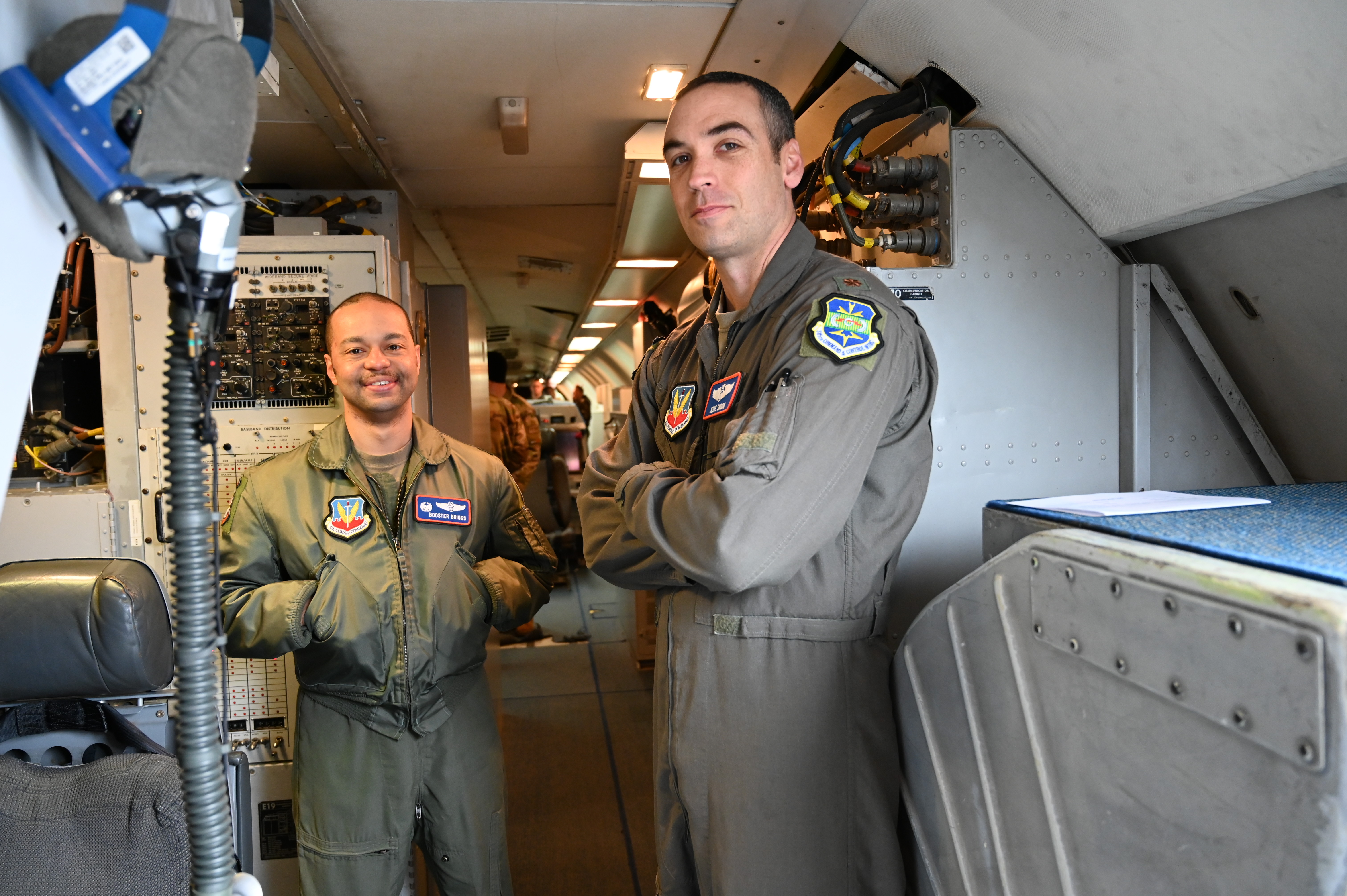 photo of two U.S. Air Force Airmen on AWACS E-3G