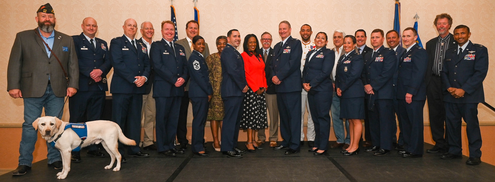 433rd Airlift Wing and 960th Cyberspace Wing military leaders and civilian Honorary Commanders stand for a photograph after the 2022 Honorary Commanders’ induction ceremony in San Antonio, April 2, 2022. The intent of the 433rd AW Honorary Commanders Program is to foster friendship between local and military communities. (U.S. Air Force photo by Airman 1st Class Mark Colmenares)