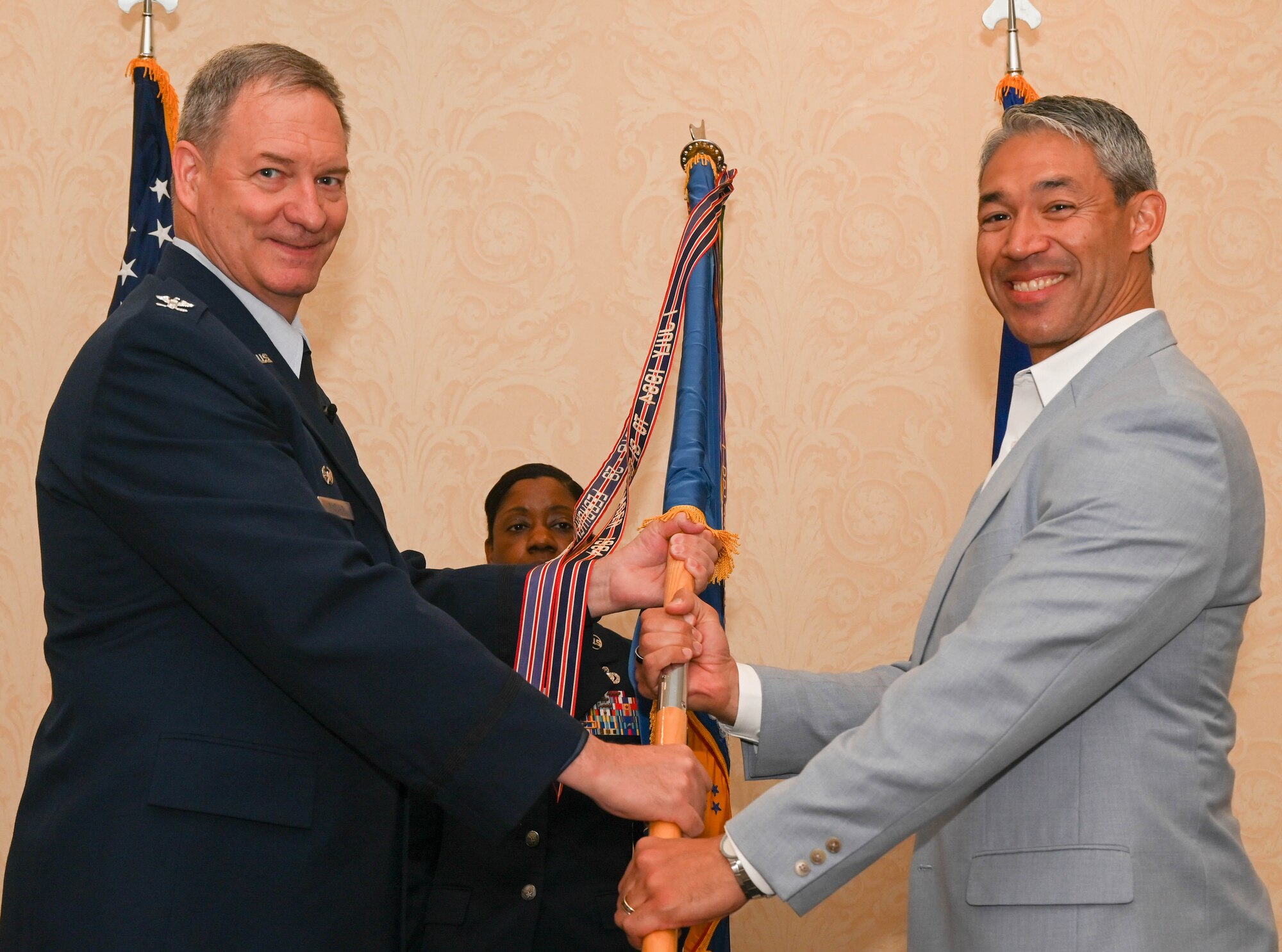 Ron Nirenberg, City of San Antonio mayor, assumes honorary command of the 433rd Airlift Wing from Col. Terry McClain, 433rd AW commander, during the Honorary Commanders’ induction ceremony in San Antonio, April 2, 2022. The intent of the 433rd AW Honorary Commanders Program is to foster friendship between local and military communities. (U.S. Air Force photo by Airman 1st Class Mark Colmenares)