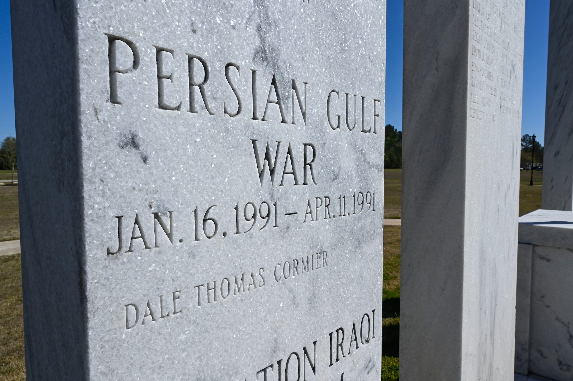 A photo of a monument honoring a military member who died in service