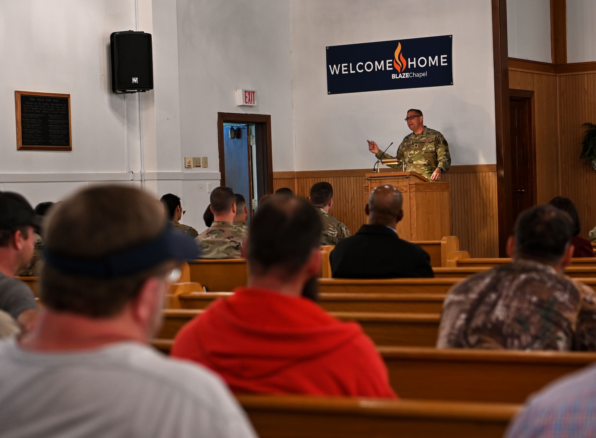 Lt. Col. Christopher Watson, 14th Flying Training Wing chaplain, speaks to a crowd at the 80th Anniversary of the Columbus Air Force Base Chapel on April 5, 2022, at Columbus AFB, Miss. The Chapel is the oldest building on Columbus AFB. (U.S. Air Force photo by Senior Airman Davis Donaldson)