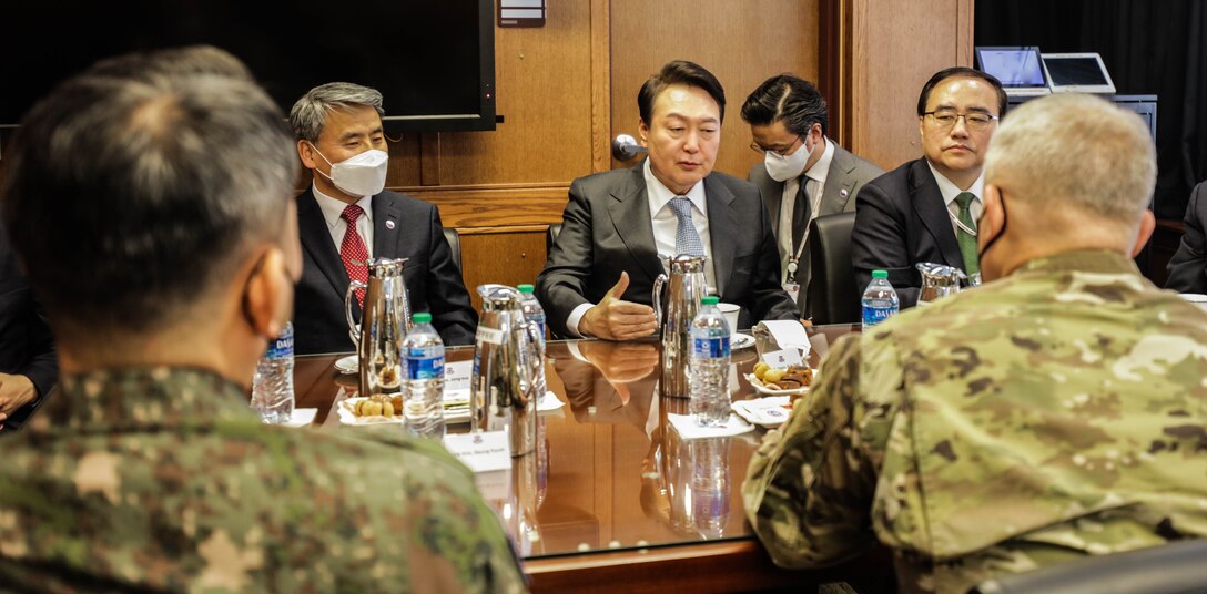 Republic of Korea President-elect Yoon, Suk-yeol conducts an office call with his staff and personnel from Combined Forces Command at Camp Humphreys, Republic of Korea, April 7, 2022. President-elect Yoon visited Humphreys to receive an overview of United Nations Command, Combined Forces Command, U.S. Forces Korea’s ironclad commitment to strengthening the US-ROK Alliance and providing a strong robust combined defense posture to maintaining peace, security, and stability of the Korean peninsula. (U.S. Army photo by Staff Sgt. Kris Bonet)