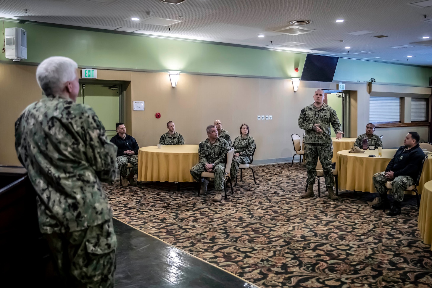 220405-N-MM501-1048 YOKOSUKA, Japan (April 5, 2022) Cryptologic Technician (Collection) 1st Class Mark Lewis, from King George, Virginia, U.S. 7th Fleet Sea Sailor of the Year candidate, speaks with Commander, U.S. 7th Fleet, Vice Adm. Karl Thomas during the opening remarks of the 7th Fleet SOY Week, April 5. U.S. 7th Fleet conducts forward-deployed naval operations in support of U.S. national interests in the Indo-Asia-Pacific area of operations. As the U.S. Navy’s largest numbered fleet, 7th Fleet interacts with 35 other maritime nations to build maritime partnerships that foster maritime security, promote stability, and prevent conflict. (U.S. Navy photo by Mass Communication Specialist 2nd Class Shannon Burns)