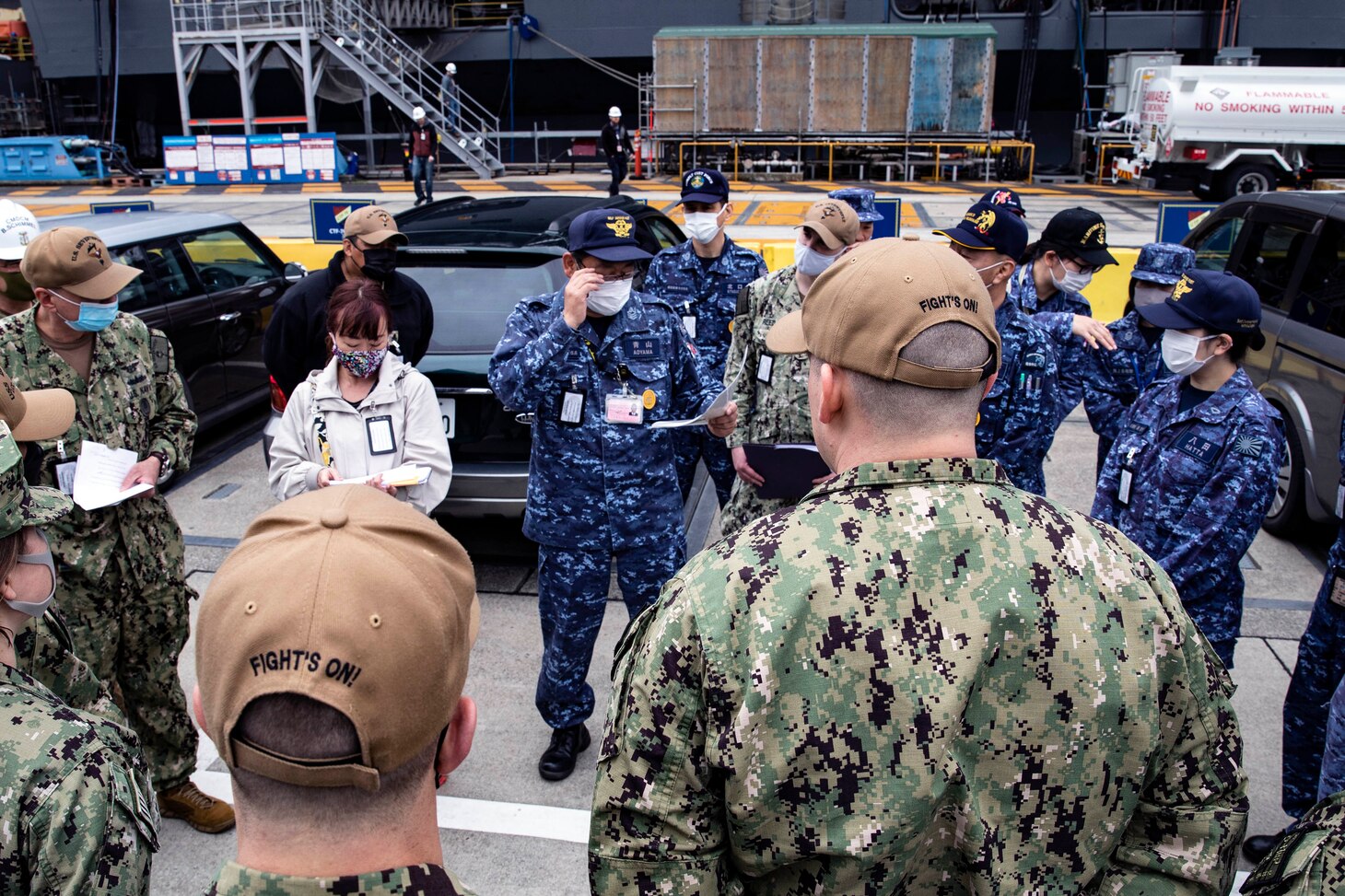 220405-N-MM501-1110 YOKOSUKA, Japan (April 5, 2022) Japan Self-Defense Fleet Master Chief Yoshihiro Aoyama, speaks to Japan Maritime Self-Defense Force and U.S. Navy Sailors on the pier before touring the U.S. Navy’s only forward-deployed aircraft carrier USS Ronald Reagan (CVN 76) during the U.S. 7th Fleet Sailor of the Year Week, April 5. U.S. 7th Fleet conducts forward-deployed naval operations in support of U.S. national interests in the Indo-Asia-Pacific area of operations. As the U.S. Navy’s largest numbered fleet, 7th Fleet interacts with 35 other maritime nations to build maritime partnerships that foster maritime security, promote stability, and prevent conflict. (U.S. Navy photo by Mass Communication Specialist 2nd Class Shannon Burns)
