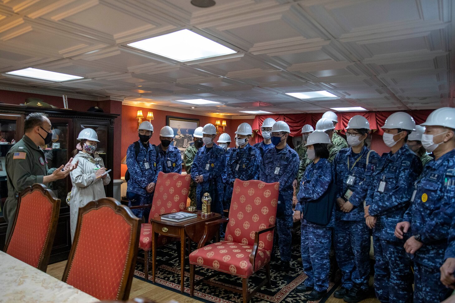 220405-N-MM501-1146 YOKOSUKA, Japan (April 5, 2022) Capt. Fred Goldhammer, commanding officer of USS Ronald Reagan (CVN 72), speaks to Japan Maritime Self-Defense Force and U.S. Navy Sailors during a tour of the ship during the U.S. 7th Fleet Sailor of the Year Week, April 5. U.S. 7th Fleet conducts forward-deployed naval operations in support of U.S. national interests in the Indo-Asia-Pacific area of operations. As the U.S. Navy’s largest numbered fleet, 7th Fleet interacts with 35 other maritime nations to build maritime partnerships that foster maritime security, promote stability, and prevent conflict. (U.S. Navy photo by Mass Communication Specialist 2nd Class Shannon Burns)