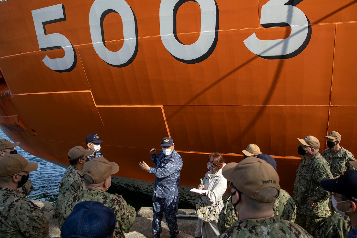 220405-N-MM501-1328 YOKOSUKA, Japan (April 5, 2022) Self-Defense Fleet Master Chief Yoshihiro Aoyama tells Japan Maritime Self-Defense Force and U.S. Navy Sailors about the JMSDF icebreaker Shirase (AGB 5003) during the U.S. 7th Fleet Sailor of the Year Week, April 5. U.S. 7th Fleet conducts forward-deployed naval operations in support of U.S. national interests in the Indo-Asia-Pacific area of operations. As the U.S. Navy’s largest numbered fleet, 7th Fleet interacts with 35 other maritime nations to build maritime partnerships that foster maritime security, promote stability, and prevent conflict. (U.S. Navy photo by Mass Communication Specialist 2nd Class Shannon Burns)