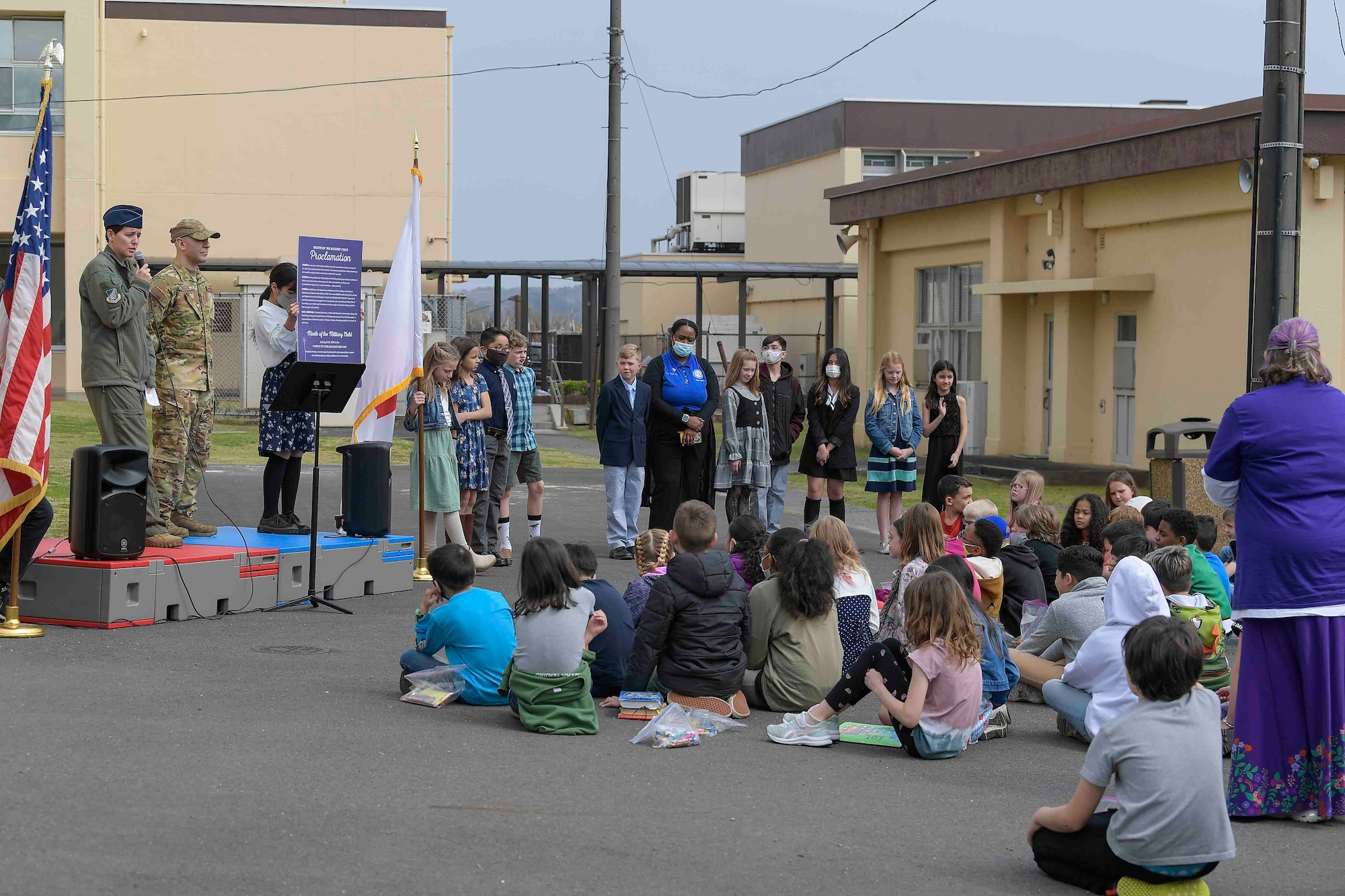 Col. Julie Gaulin, 374th Airlift Wing vice commander, speaks to students about the importance of Month of a Military Child during a proclamation event at Yokota Air Base, Japan, April 7, 2022.