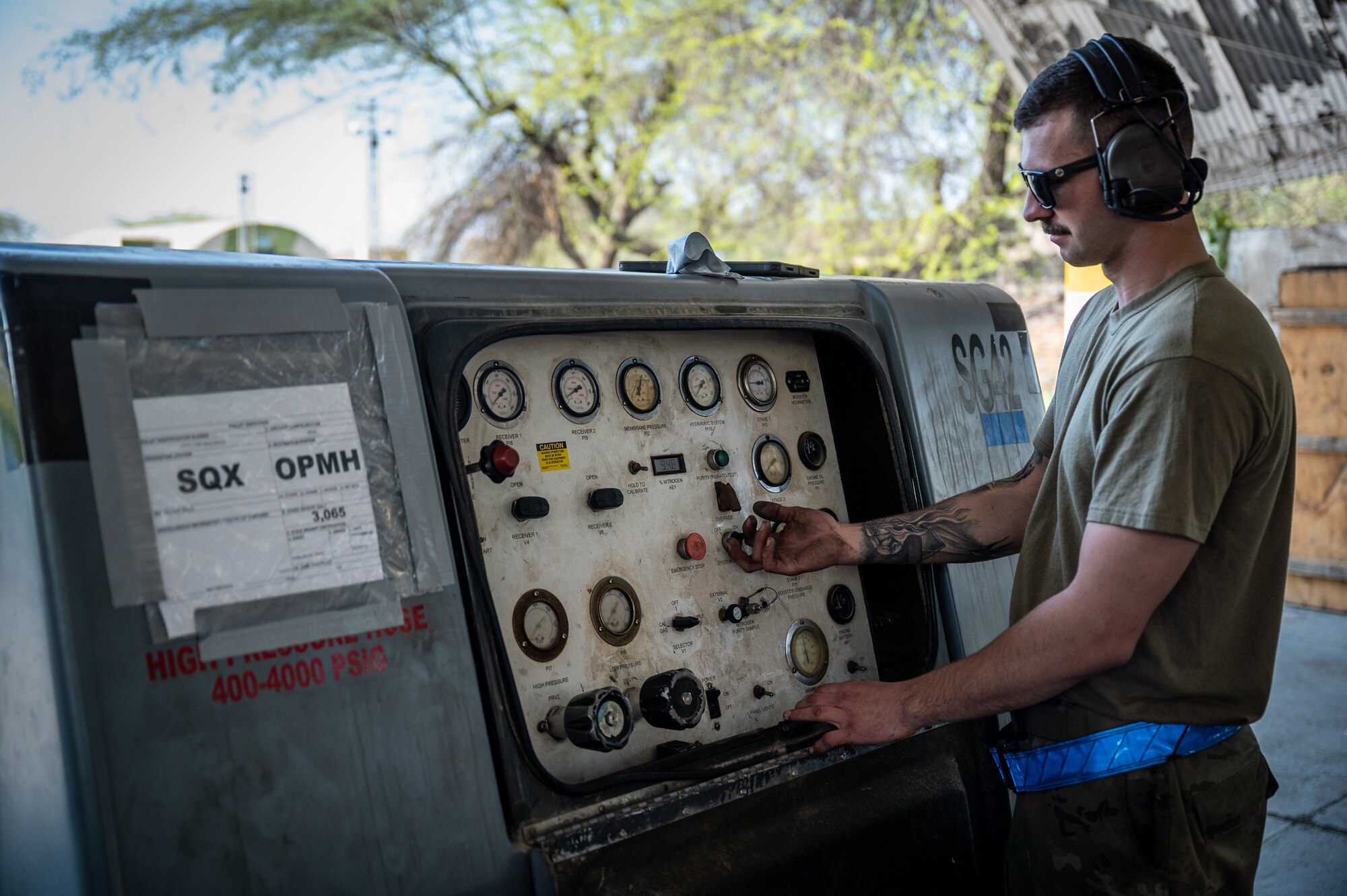 Senior Airman Clay Fulfer, 55th Expeditionary Fighter Generation Squadron dedicated crew chief, builds nitrogen cart pressure to perform services for U.S. Air Force F-16 Fighting Falcon aircraft Feb. 27, 2022 during Falcon Talon 2022 at a Pakistan operational air force base. This Agile Combat Employment operation is the first bilateral training event between the United States and Pakistan since 2019. (U.S. Air Force photo by Master Sgt. Christopher Parr)