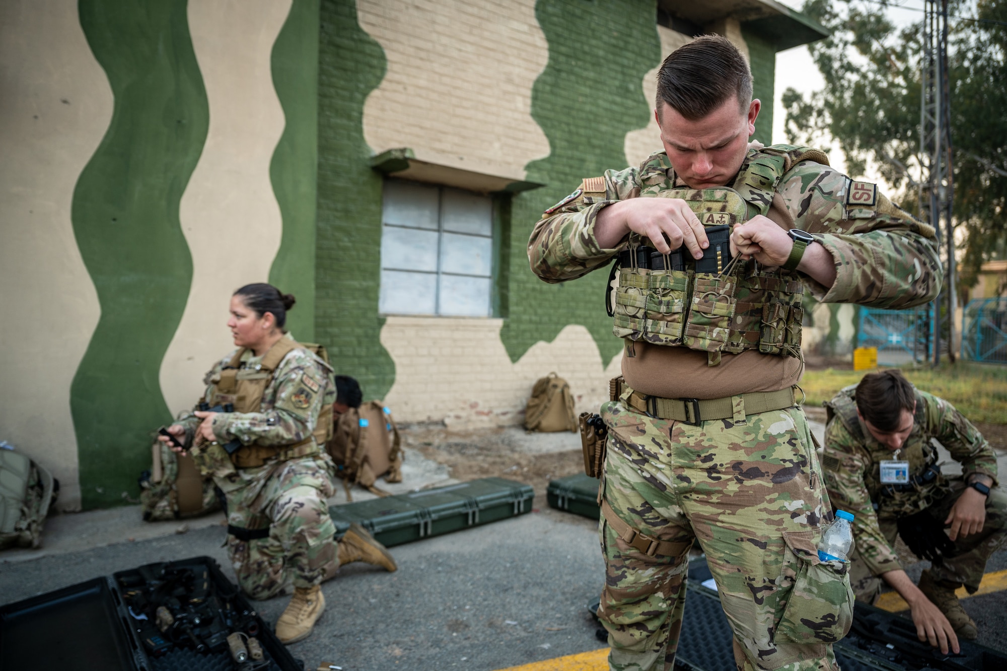 U.S. Air Force Security Forces members prepare to start their shift guarding aircraft at a Pakistan operational air force base, March 4, 2022. U.S. Air Force members from across the Air Forces Central area of responsibility deployed to Pakistan in support of Falcon Talon 2022. This Agile Combat Employment operation, held Feb. 28 – March 4, 2022, is the first bilateral training event between the United States and Pakistan since 2019. (U.S. Air Force photo by Master Sgt. Christopher Parr)