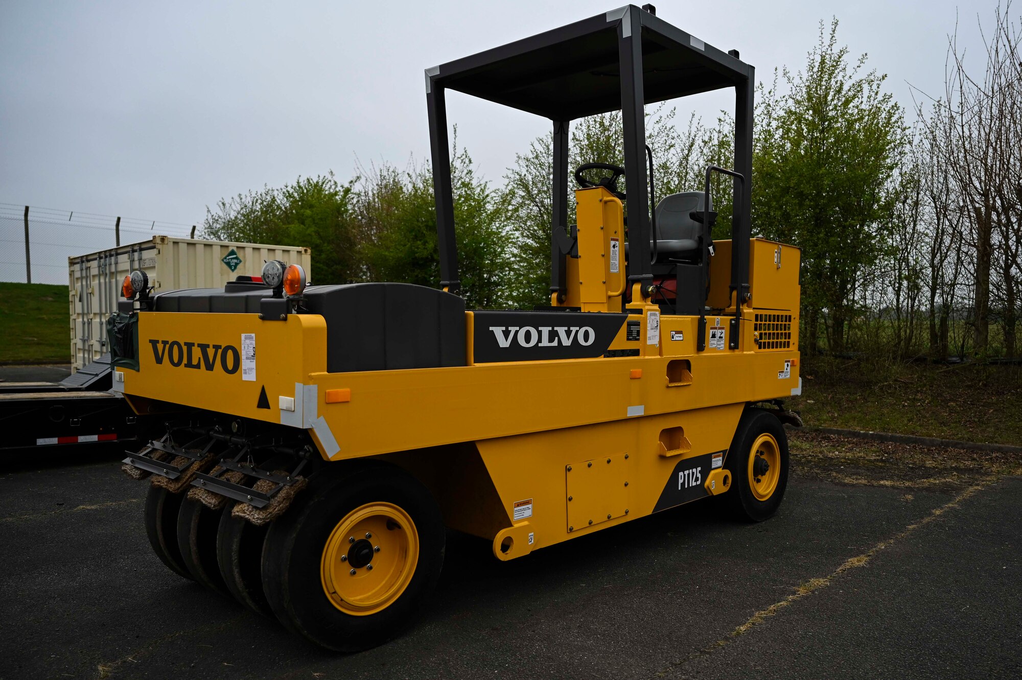 A KM T-2 asphalt recycling machine stands at Royal Air Force Mildenhall, England, March 30, 2022. The trailer recycles material into plant-grade asphalt to help patch holes in an airfield or street. (U.S. Air Force photo by Airman 1st Class Viviam Chiu)