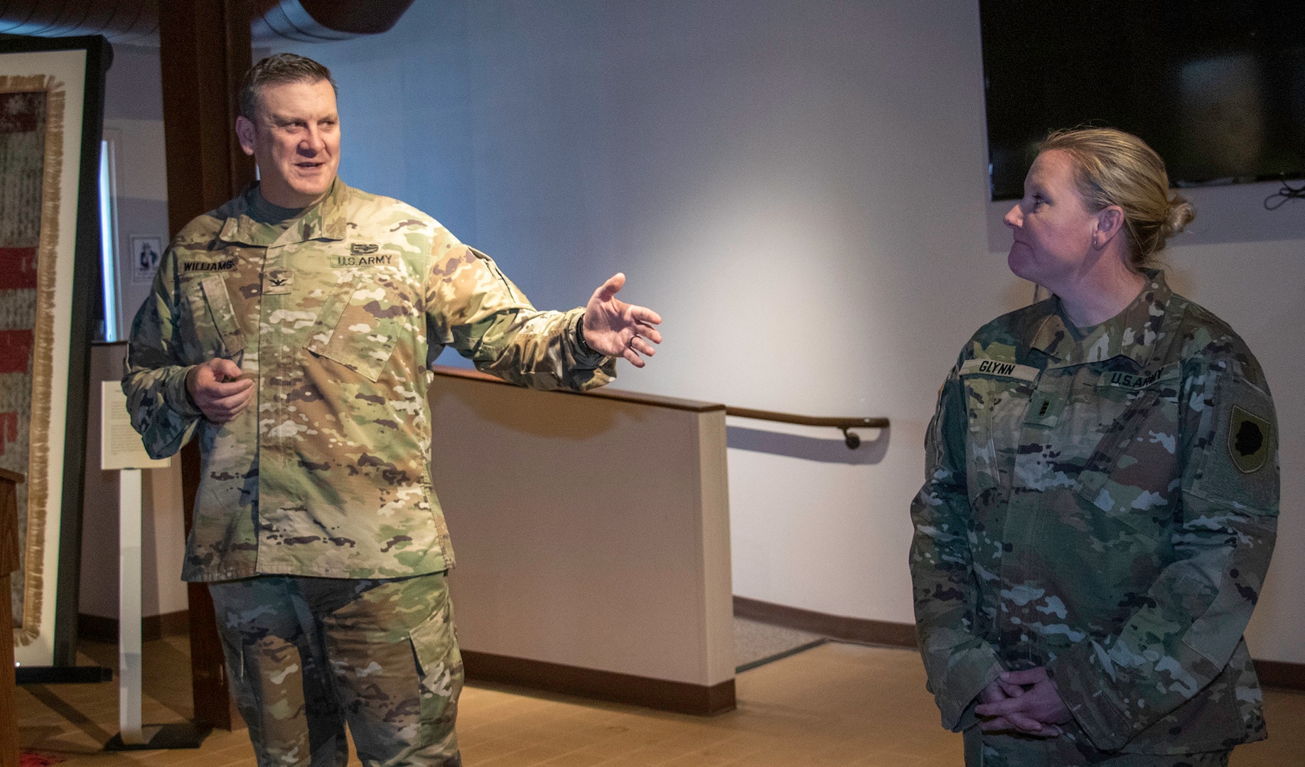 Col. Lenny Williams, Chief of Staff, Illinois Army National Guard, congratulates newly promoted Chief Warrant Officer 4 Lindsay Glynn, of Springfield, during a promotion ceremony March 25 at the Illinois State Military Museum.