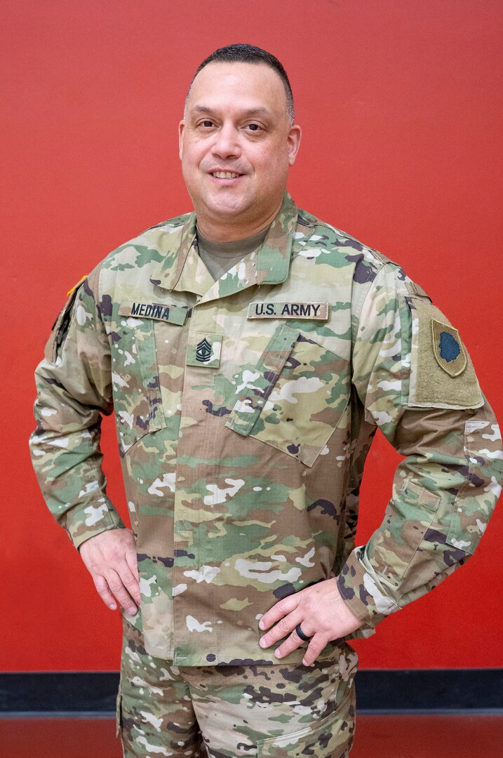 First Sgt. Dennis Medina of Chicago, Illinois, after his promotion ceremony at the National Guard Armory in Aurora, Illinois, March 26.  Medina is the Delta Company first sergeant with the Recruiting and Retention Battalion in Aurora, Illinois.