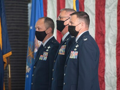 Brig. Gen. Daniel Boyack, Utah National Guard commander and Assistant Adjutant General-Air (left), Col. Kurt Davis, off going 151st Air Refueling Wing commander (center) and Col. Robert Taylor, Oncoming commander 151 ARW (right), participate in a change of command a time honored military tradition where one commander relinquishes command to another on February 5, 2022 at Roland R. Wright Air National Guard Base.