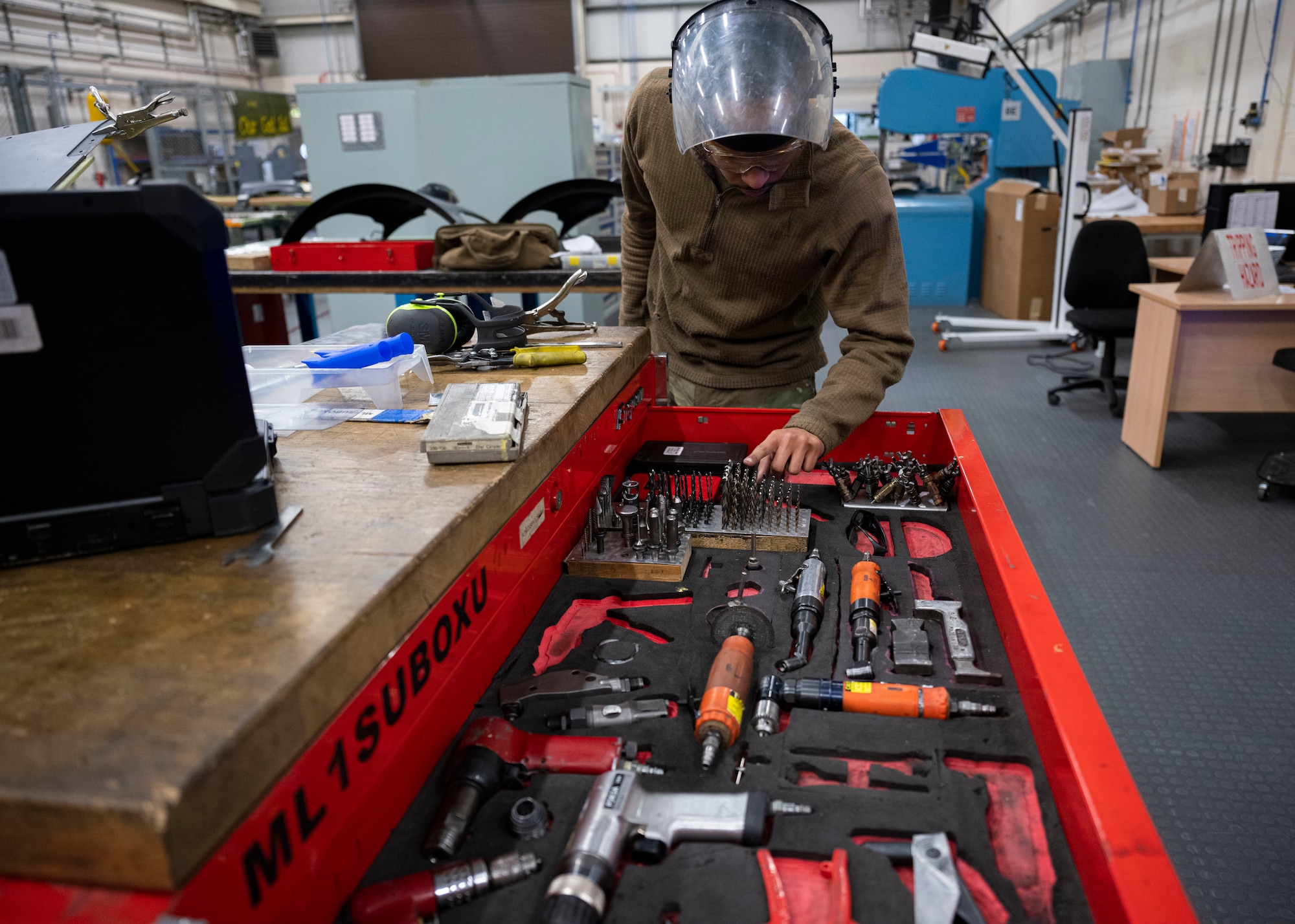 The Airmen work on the structural integrity of the aircraft to ensure continued operability.