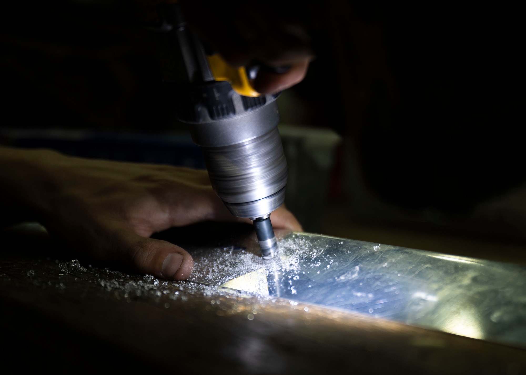 The Airmen work on the structural integrity of the aircraft to ensure continued operability.