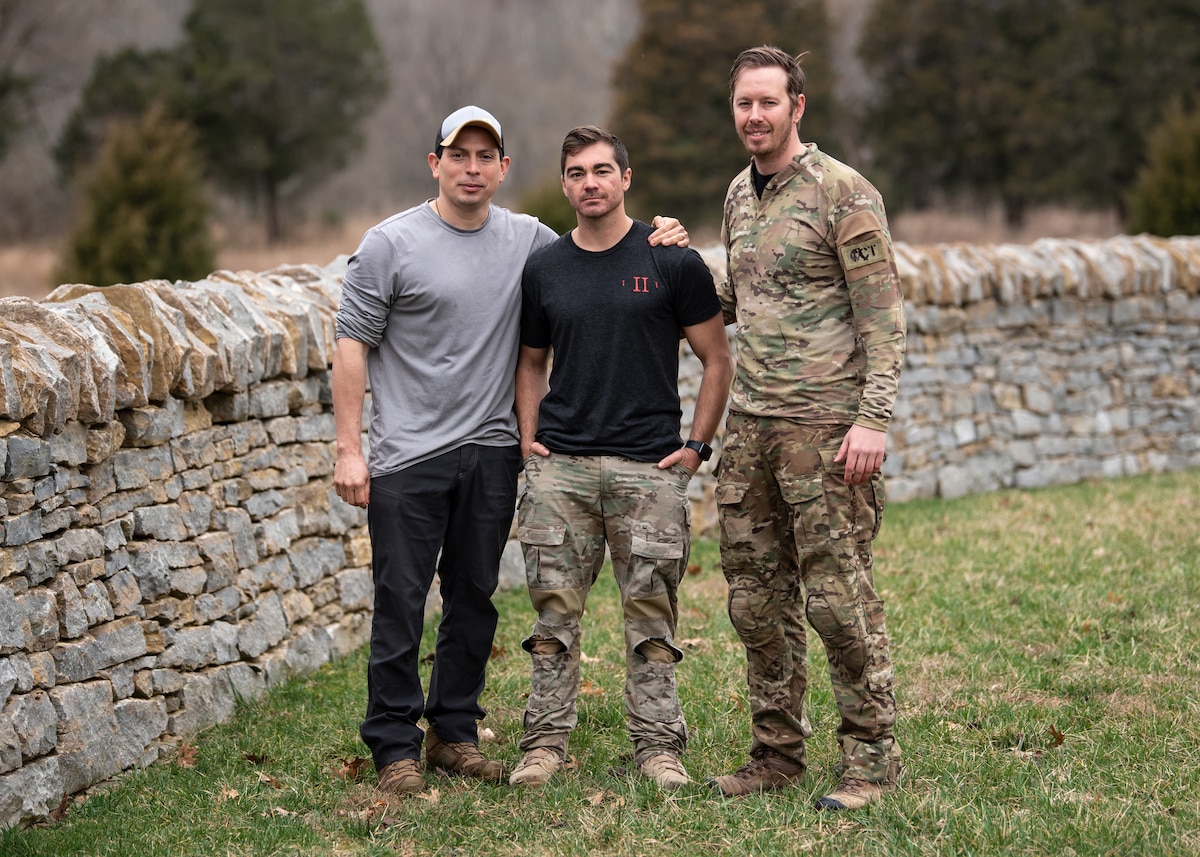 Three pararescuemen from the Kentucky Air National Guard's 123rd Special Tactics Squadron rescued a drowning infant at a pool in Louisville, Ky., March 15, 2022. Master Sgt. Elmer Quijada, left; Tech. Sgt. Ryan Penne, center; and Master Sgt. Devin Butcher, who were conducting unrelated training at the pool, administered life-saving aid to the child, who had stopped breathing. (U.S. Air National Guard photo by Dale Greer)