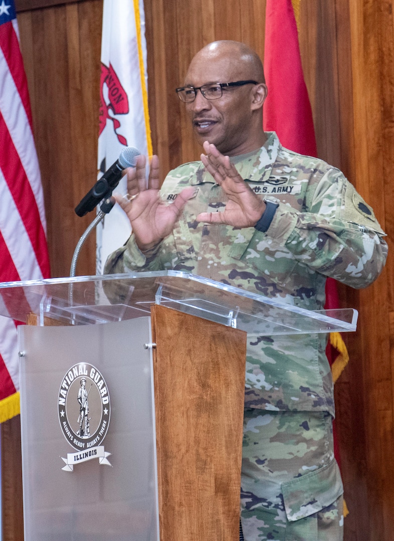 Brig. Gen. Rodney Boyd, of Naperville, Assistant Adjutant General-Army and Commander of the Illinois Army National Guard, thanks Sgt. Maj. David Owsley, of Forsyth, for his nearly 33 years of military service during Owsley's retirement ceremony April 1 at Camp Lincoln, Springfield.