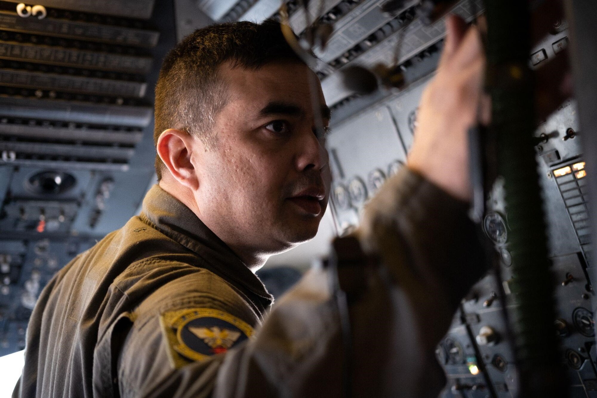 Tech. Sgt. Melang Loeak adjusts knobs