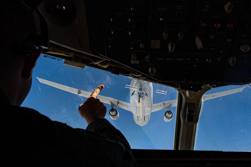 Man points at KC-10 Extender