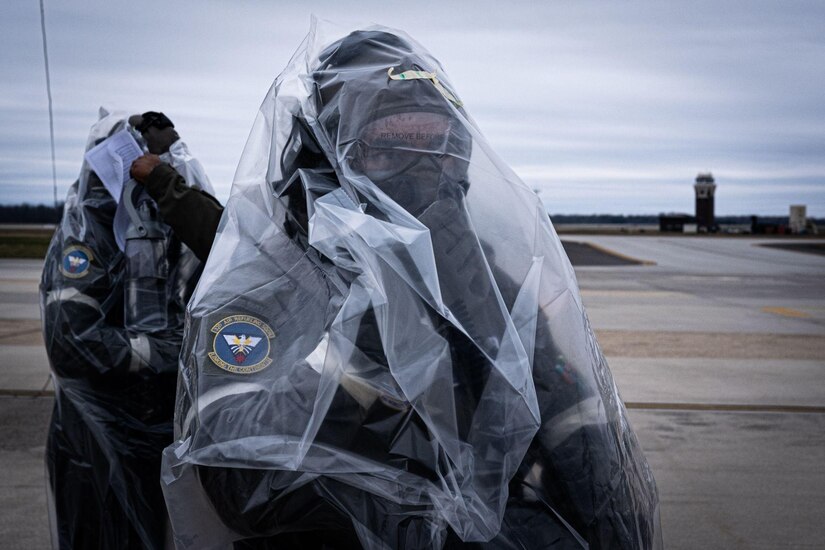 Man in aircrew eye and respiratory protection system