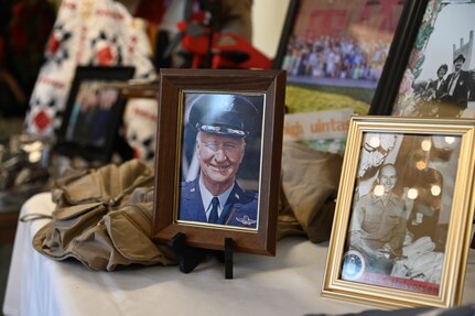 A photo of retired U.S. Air Force Col. Gail Halvorsen and paraphernalia from his storied career and life are displayed at his funeral Feb. 22, 2022, in Provo, Utah.