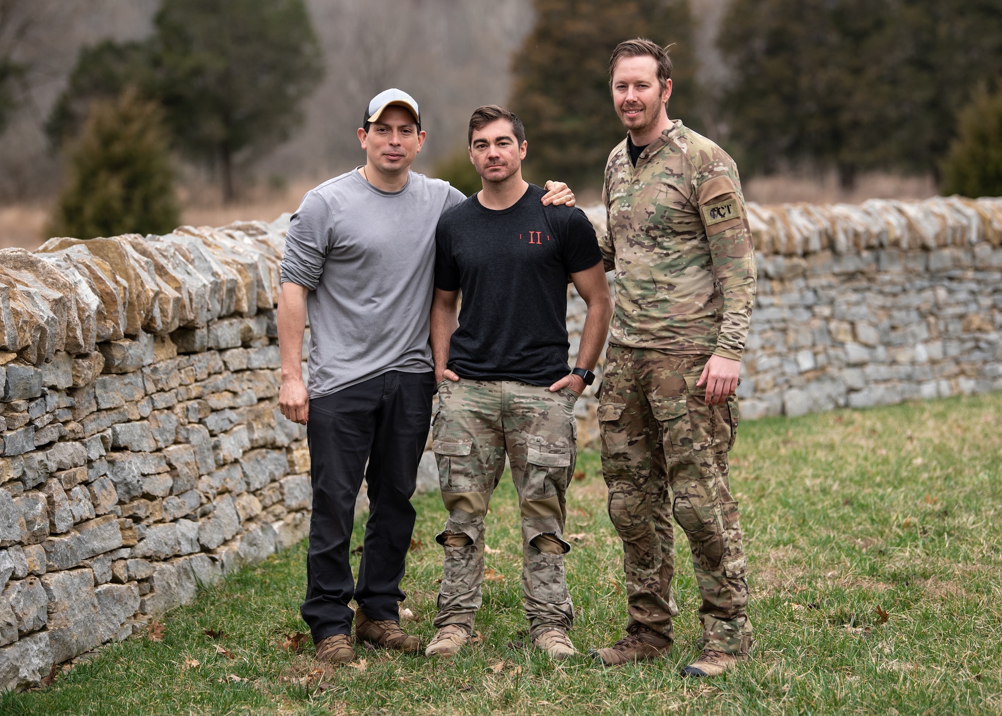 Three pararescuemen from the Kentucky Air National Guard's 123rd Special Tactics Squadron rescued a drowning child at a pool in Louisville, Ky., March 15, 2022. Master Sgt. Elmer Quijada, left; Tech. Sgt. Ryan Penne, center; and Master Sgt. Devin Butcher, who were conducting unrelated training at the pool and are certified paramedics, administered life-saving aid to the child, who had stopped breathing.