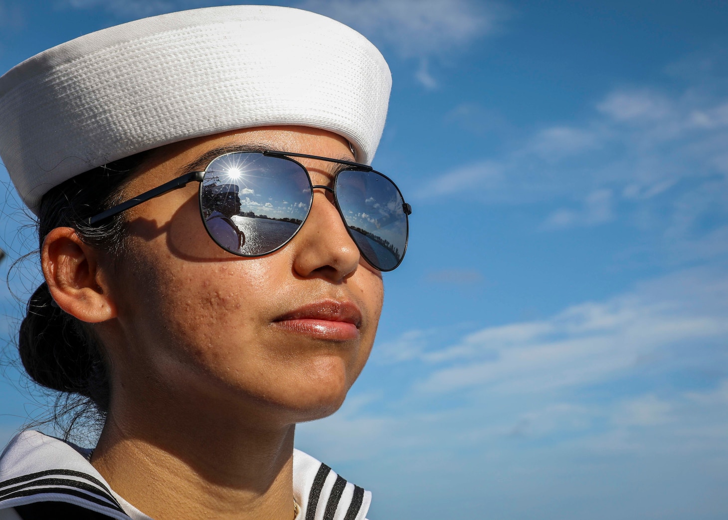 NASSAU, Bahamas (April 3, 2022) – Gunner's Mate Seaman Nayeli Lara mans the rails during a sea-and-anchor detail aboard the Arleigh Burke-class guided-missile destroyer USS Porter (DDG 78), April 3. Porter, forward-deployed to Rota, Spain, is currently in the U.S. 2nd Fleet area of operations to conduct routine certifications and training. (U.S. Navy photo by Mass Communication Specialist 1st Class Eric Coffer/Released)